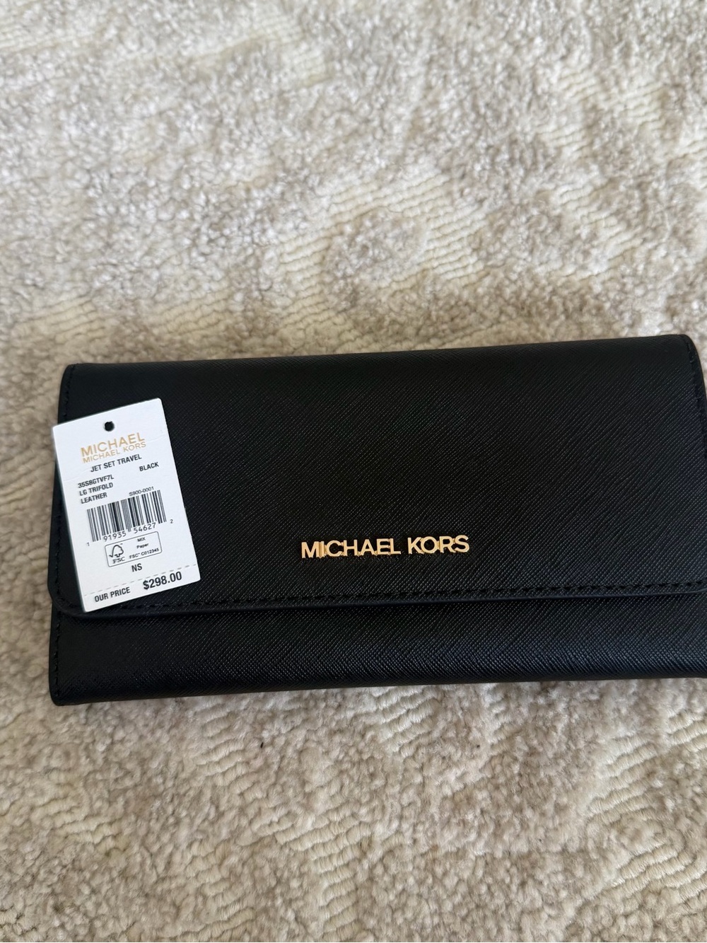 Michael Kors Jet Set Large Logo Trifold Wallet - Black

BRAND NEW